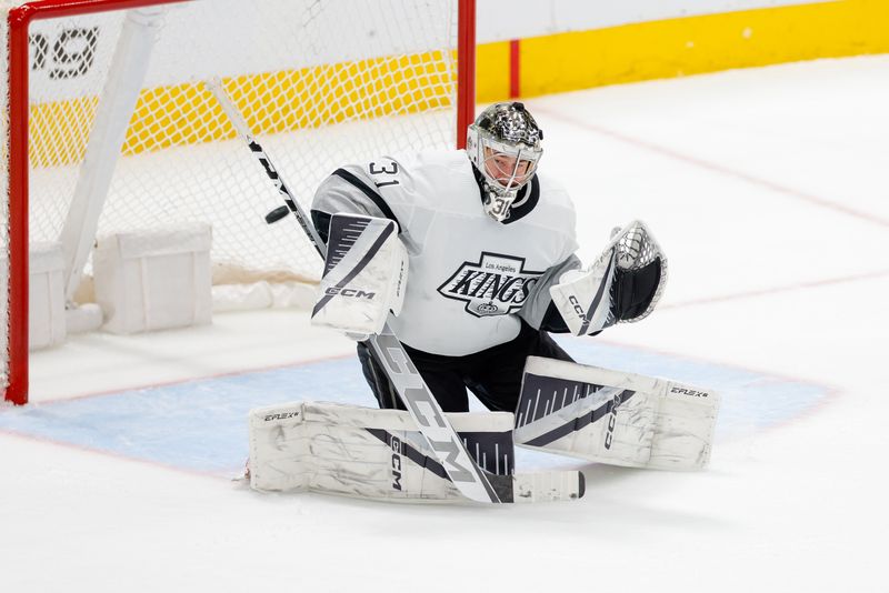 Mar 16, 2024; Dallas, Texas, USA; Los Angeles Kings goaltender David Rittich (31) fights off a shot during the third period against the Dallas Stars at American Airlines Center. Mandatory Credit: Andrew Dieb-USA TODAY Sports