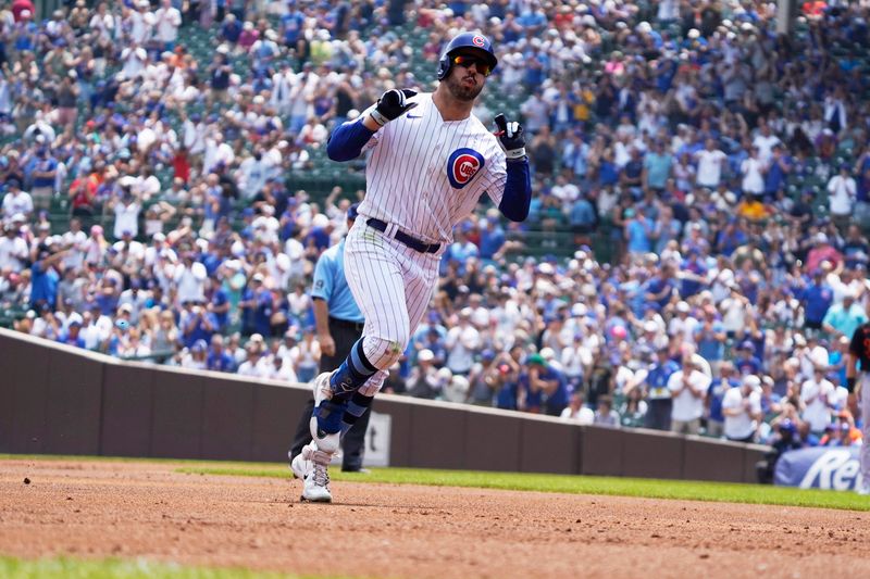 Jun 18, 2023; Chicago, Illinois, USA; Chicago Cubs center fielder Mike Tauchman (40) runs the bases after hitting a home run against the Baltimore Orioles during the first inning at Wrigley Field. Mandatory Credit: David Banks-USA TODAY Sports