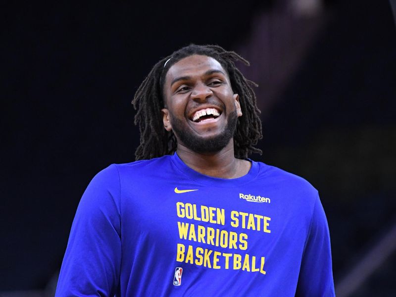 SAN FRANCISCO, CA - APRIL 14: Kevon Looney #5 of the Golden State Warriors smiles before the game against the Utah Jazz on April 14, 2024 at Chase Center in San Francisco, California. NOTE TO USER: User expressly acknowledges and agrees that, by downloading and or using this photograph, user is consenting to the terms and conditions of Getty Images License Agreement. Mandatory Copyright Notice: Copyright 2024 NBAE (Photo by Noah Graham/NBAE via Getty Images)