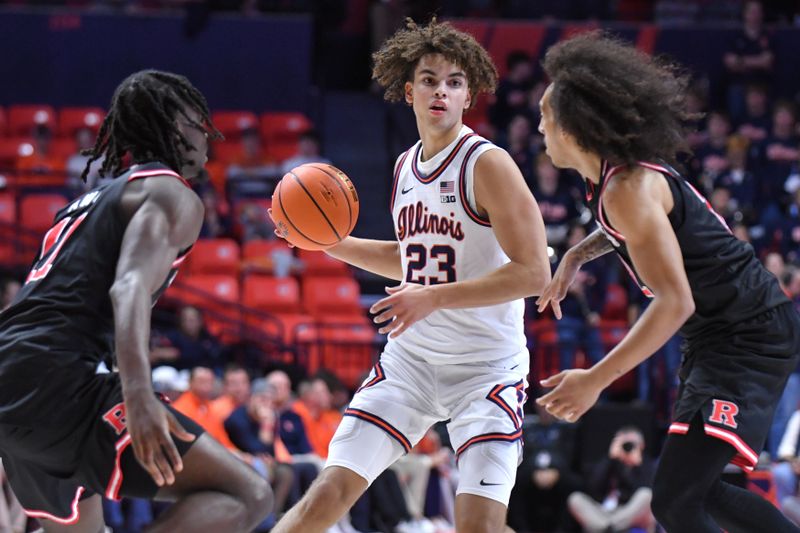 Jan 8, 2026; Champaign, Illinois, USA;  Illinois Fighting Illini guard Keaton Wagler (23) looks to pass between Rutgers Scarlet Knights players during the first half at State Farm Center. Mandatory Credit: Ron Johnson-Imagn Images