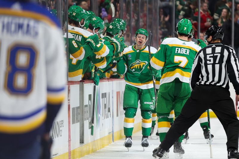 Mar 23, 2024; Saint Paul, Minnesota, USA; Minnesota Wild center Marco Rossi (23) celebrates his goal against the St. Louis Blues during the second period at Xcel Energy Center. Mandatory Credit: Matt Krohn-USA TODAY Sports