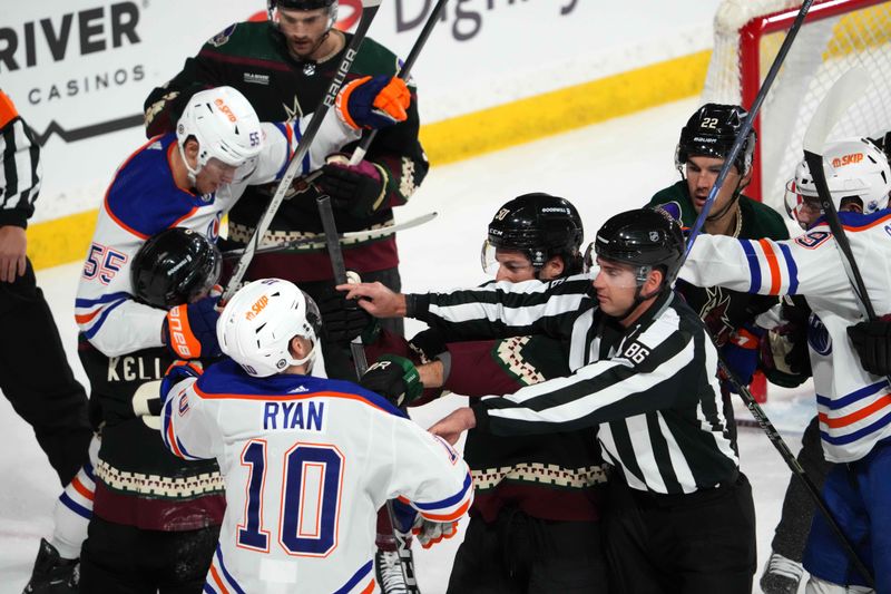 Feb 19, 2024; Tempe, Arizona, USA; Arizona Coyotes and Edmonton Oilers players scrum during the first period at Mullett Arena. Mandatory Credit: Joe Camporeale-USA TODAY Sports