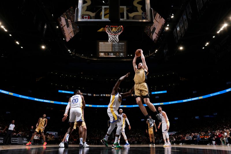 TORONTO, CANADA - MARCH 1:  Jakob Poeltl #19 of the Toronto Raptors goes to the basket during the game on March 1, 2024 at the Scotiabank Arena in Toronto, Ontario, Canada.  NOTE TO USER: User expressly acknowledges and agrees that, by downloading and or using this Photograph, user is consenting to the terms and conditions of the Getty Images License Agreement.  Mandatory Copyright Notice: Copyright 2024 NBAE (Photo by Mark Blinch/NBAE via Getty Images)