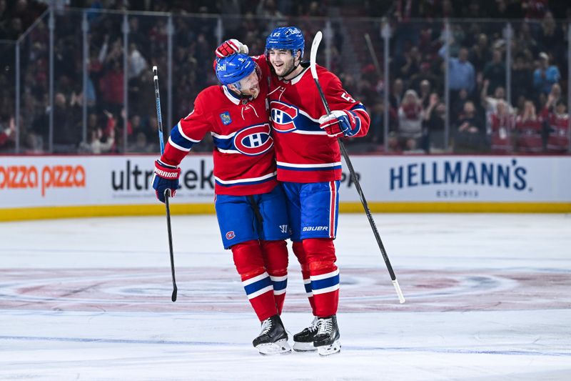 Jan 8, 2026; Montreal, Quebec, CAN; Montreal Canadiens defenseman Noah Dobson (53) celebrates with defenseman Mike Matheson (8) his goal against the Florida Panthers during the first period at Bell Centre. Mandatory Credit: David Kirouac-Imagn Images