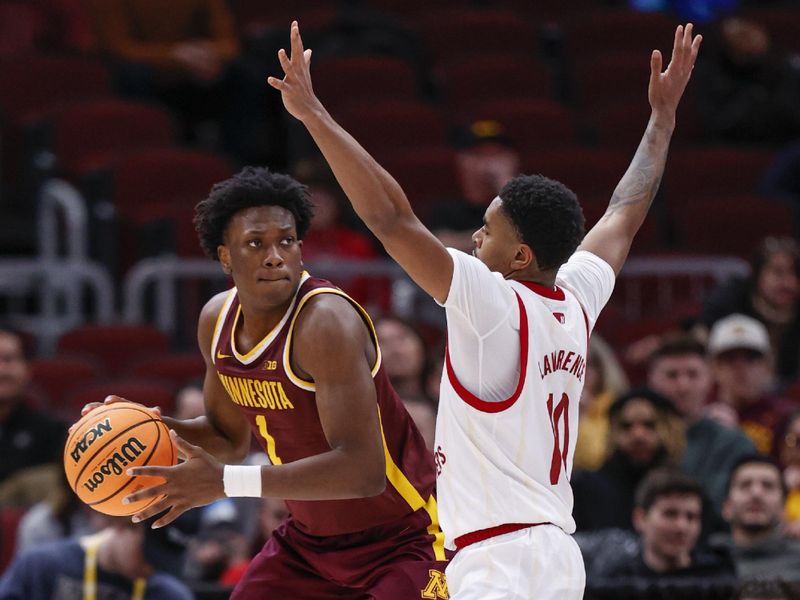 Mar 8, 2023; Chicago, IL, USA; Minnesota Golden Gophers forward Joshua Ola-Joseph (1) looks to pass the ball against Nebraska Cornhuskers guard Jamarques Lawrence (10) during the second half at United Center. Mandatory Credit: Kamil Krzaczynski-USA TODAY Sports