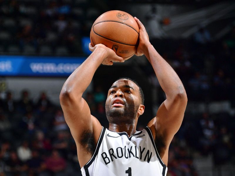 SAN ANTONIO, TX - JANUARY 17: T.J. Warren #1 of the Brooklyn Nets shoots a free throw during the game against the San Antonio Spurs on January 17, 2023 at the AT&T Center in San Antonio, Texas. NOTE TO USER: User expressly acknowledges and agrees that, by downloading and or using this photograph, user is consenting to the terms and conditions of the Getty Images License Agreement. Mandatory Copyright Notice: Copyright 2022 NBAE (Photos by Michael Gonzales/NBAE via Getty Images)