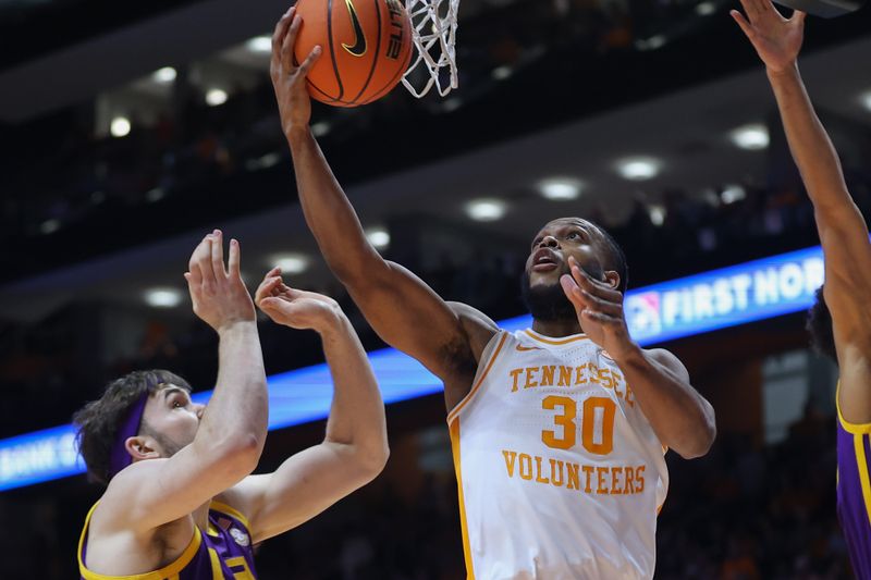 Feb 7, 2024; Knoxville, Tennessee, USA; Tennessee Volunteers guard Josiah-Jordan James (30) goes to the basket against the LSU Tigers during the first half at Thompson-Boling Arena at Food City Center. Mandatory Credit: Randy Sartin-USA TODAY Sports