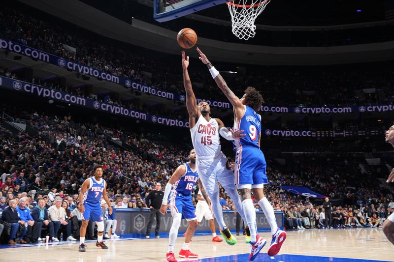 PHILADELPHIA, PA - NOVEMBER 13: Donovan Mitchell #45 of the Cleveland Cavaliers drives to the basket during the game against the Philadelphia 76ers on November 13, 2024 at the Wells Fargo Center in Philadelphia, Pennsylvania NOTE TO USER: User expressly acknowledges and agrees that, by downloading and/or using this Photograph, user is consenting to the terms and conditions of the Getty Images License Agreement. Mandatory Copyright Notice: Copyright 2024 NBAE (Photo by Jesse D. Garrabrant/NBAE via Getty Images)