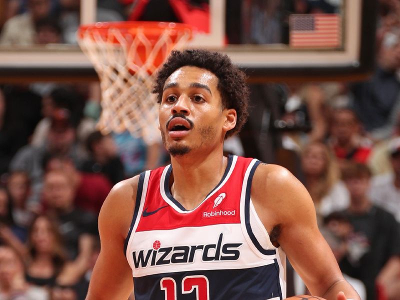 MIAMI, FL - MARCH 10: Jordan Poole #13 of the Washington Wizards looks on during the game against the Miami Heat on March 10, 2024 at Kaseya Center in Miami, Florida. NOTE TO USER: User expressly acknowledges and agrees that, by downloading and or using this Photograph, user is consenting to the terms and conditions of the Getty Images License Agreement. Mandatory Copyright Notice: Copyright 2024 NBAE (Photo by Issac Baldizon/NBAE via Getty Images)