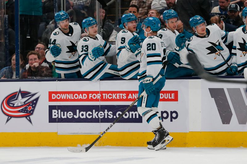 Mar 16, 2024; Columbus, Ohio, USA; San Jose Sharks left wing Fabian Zetterlund (20) celebrates his goal against the Columbus Blue Jackets during the second period at Nationwide Arena. Mandatory Credit: Russell LaBounty-USA TODAY Sports