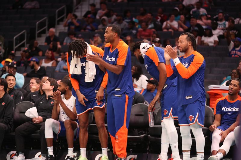 CHARLOTTE, NC - OCTOBER 6: New York Knicks bench celebrates during the game against the Charlotte Hornets during an NBA Pre Season game on October 6, 2024 at Spectrum Center in Charlotte, North Carolina. NOTE TO USER: User expressly acknowledges and agrees that, by downloading and or using this photograph, User is consenting to the terms and conditions of the Getty Images License Agreement. Mandatory Copyright Notice: Copyright 2024 NBAE (Photo by Brock Williams-Smith/NBAE via Getty Images)