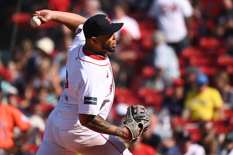 Aug 11, 2024; Boston, Massachusetts, USA; Boston Red Sox first baseman Dominic Smith (2) pitches against the Houston Astros during the ninth inning at Fenway Park. Mandatory Credit: Eric Canha-USA TODAY Sports