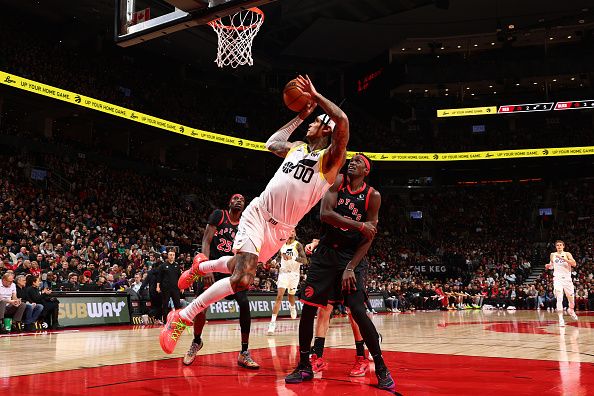 TORONTO, CANADA - DECEMBER 23:  Jordan Clarkson #00 of the Utah Jazz shoots the ball during the game against the Toronto Raptors on December 23, 2023 at the Scotiabank Arena in Toronto, Ontario, Canada.  NOTE TO USER: User expressly acknowledges and agrees that, by downloading and or using this Photograph, user is consenting to the terms and conditions of the Getty Images License Agreement.  Mandatory Copyright Notice: Copyright 2023 NBAE (Photo by Vaughn Ridley/NBAE via Getty Images)