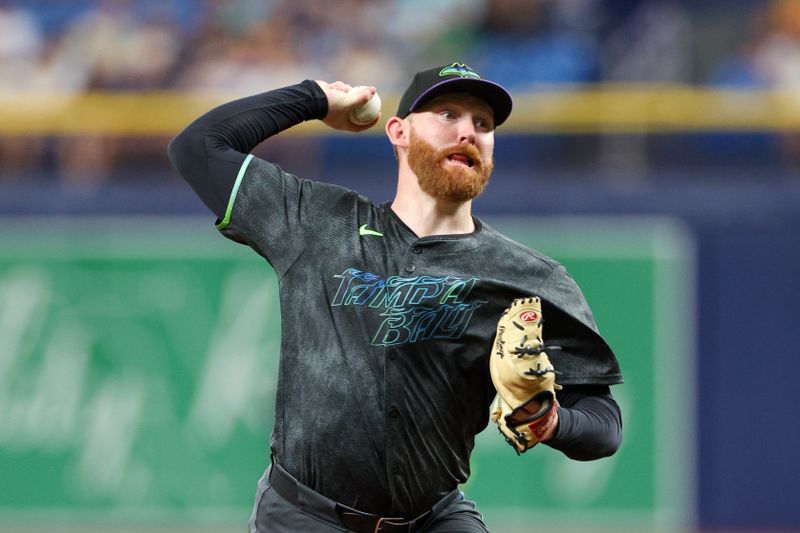 Jul 13, 2024; St. Petersburg, Florida, USA; Tampa Bay Rays pitcher Zack Littell (52) throws a pitch against the Cleveland Guardians in the second inning at Tropicana Field. Mandatory Credit: Nathan Ray Seebeck-USA TODAY Sports