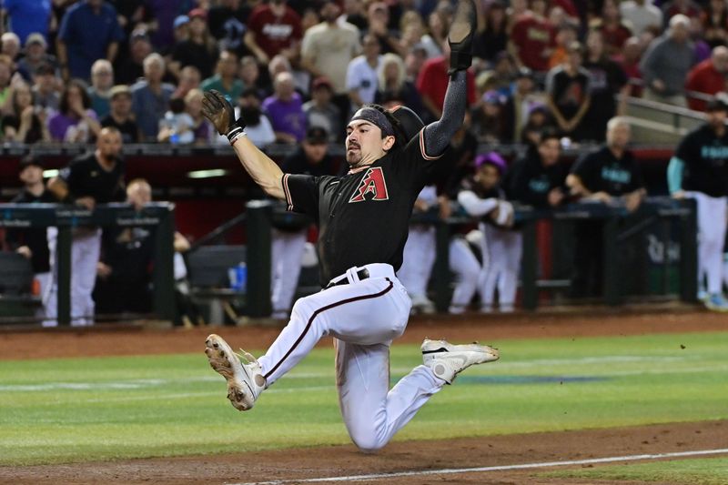 Sep 19, 2023; Phoenix, Arizona, USA; Arizona Diamondbacks left fielder Corbin Carroll (7) scores in the second inning against the San Francisco Giants at Chase Field. Mandatory Credit: Matt Kartozian-USA TODAY Sports