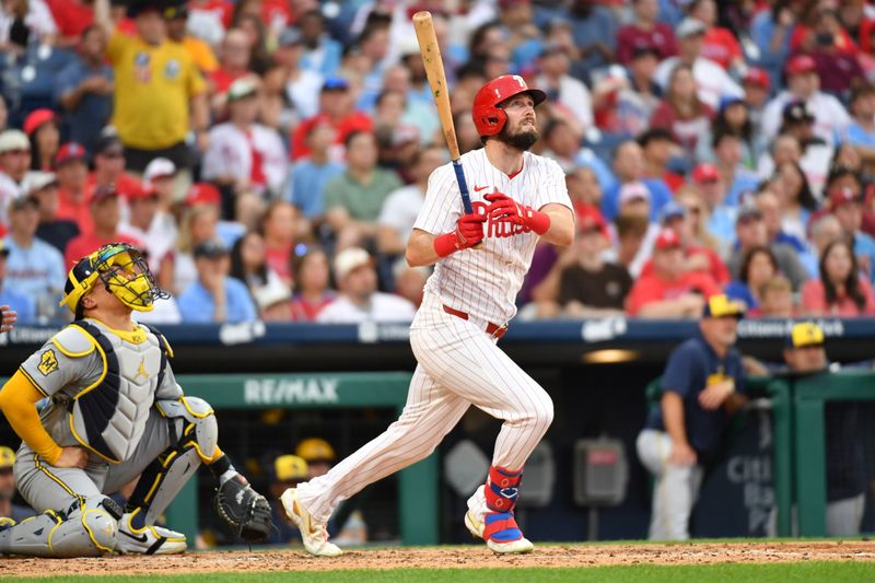 Jun 3, 2024; Philadelphia, Pennsylvania, USA; Philadelphia Phillies outfielder Davide Dahl (35) watches his home run against the Milwaukee Brewers during the fourth inning at Citizens Bank Park. Mandatory Credit: Eric Hartline-USA TODAY Sports