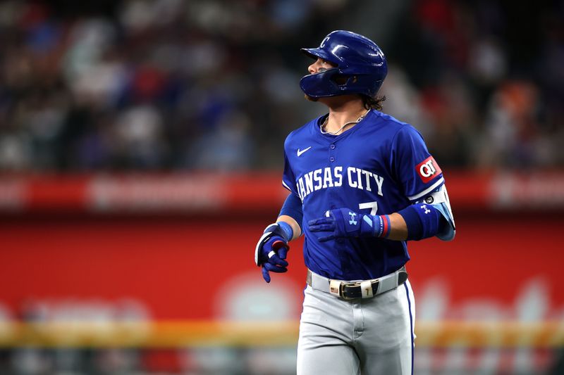 Jun 22, 2024; Arlington, Texas, USA; Kansas City Royals shortstop Bobby Witt Jr. (7) jogs off the field after making an out in the first inning against the Texas Rangers at Globe Life Field. Mandatory Credit: Tim Heitman-USA TODAY Sports