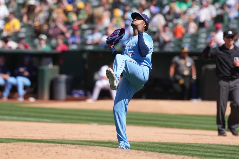 Jun 9, 2024; Oakland, California, USA; Toronto Blue Jays relief pitcher Genesis Cabrera (92) reacts after defeating the Oakland Athletics at Oakland-Alameda County Coliseum. Mandatory Credit: Darren Yamashita-USA TODAY Sports