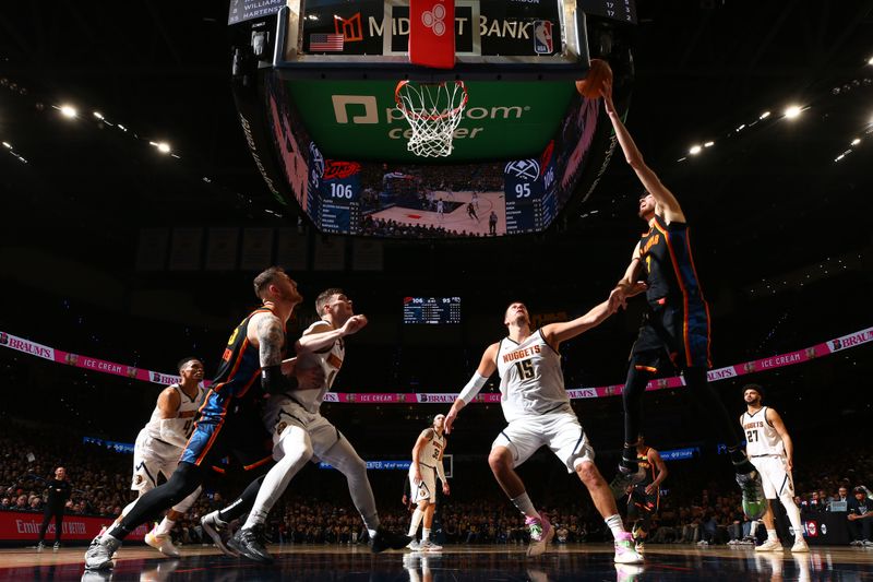 OKLAHOMA CITY, OK - MAY 5: Chet Holmgren #7 of the Oklahoma City Thunder drives to the basket during the game against the Denver Nuggets  during Round Two Game One of the 2025 NBA Playoffs on MAY 5, 2025 at Paycom Center in Oklahoma City, Oklahoma. NOTE TO USER: User expressly acknowledges and agrees that, by downloading and or using this photograph, User is consenting to the terms and conditions of the Getty Images License Agreement. Mandatory Copyright Notice: Copyright 2025 NBAE (Photo by Zach Beeker/NBAE via Getty Images)