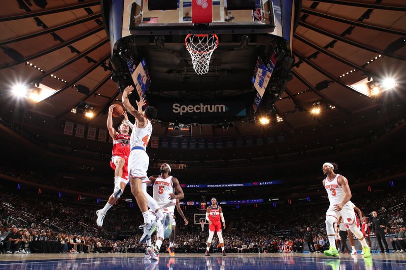 NEW YORK, NY - OCTOBER 9: Corey Kispert #24 of the Washington Wizards drives to the basket during the game against the New York Knicks during the 2024 NBA Preseason on October 9, 2024 at Madison Square Garden in New York City, New York.  NOTE TO USER: User expressly acknowledges and agrees that, by downloading and or using this photograph, User is consenting to the terms and conditions of the Getty Images License Agreement. Mandatory Copyright Notice: Copyright 2024 NBAE  (Photo by Nathaniel S. Butler/NBAE via Getty Images)