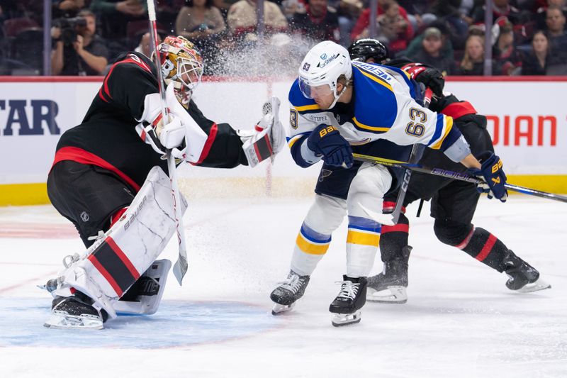 Oct 29, 2024; Ottawa, Ontario, CAN; Ottawa Senators goalie Linus Ullmark (35) makes a save on a shot from St. Louis Blues left wing Jake Neighbours (63) in the second period at the Canadian Tire Centre. Mandatory Credit: Marc DesRosiers-Imagn Images