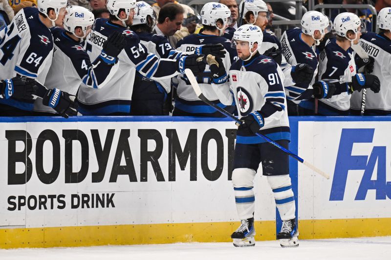 May 2, 2025; St. Louis, Missouri, USA; Winnipeg Jets center Cole Perfetti (91) celebrates with teammates after scoring a goal against the St. Louis Blues during the second period in game six of the first round of the 2025 Stanley Cup Playoffs at Enterprise Center. Mandatory Credit: Connor Hamilton-Imagn Images