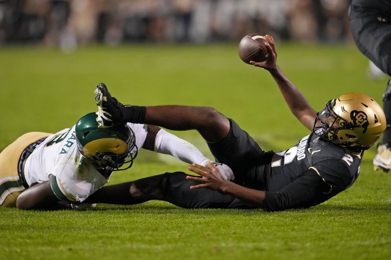 Sep 16, 2023; Boulder, Colorado, USA; Colorado State Rams defensive lineman Mohamed Kamara (8) sacks Colorado Buffaloes quarterback Shedeur Sanders (2) during the first half at Folsom Field. Mandatory Credit: Andrew Wevers-USA TODAY Sports