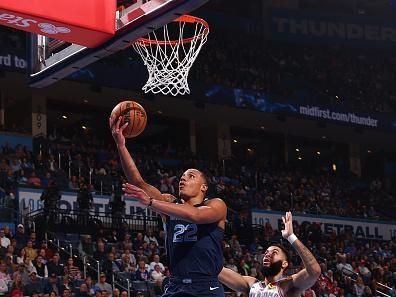 OKLAHOMA CITY, OK - DECEMBER 18: Desmond Bane #22 of the Memphis Grizzlies drives to the basket during the game against the Oklahoma City Thunder on December 18, 2023 at Paycom Arena in Oklahoma City, Oklahoma. NOTE TO USER: User expressly acknowledges and agrees that, by downloading and or using this photograph, User is consenting to the terms and conditions of the Getty Images License Agreement. Mandatory Copyright Notice: Copyright 2023 NBAE (Photo by Zach Beeker/NBAE via Getty Images)