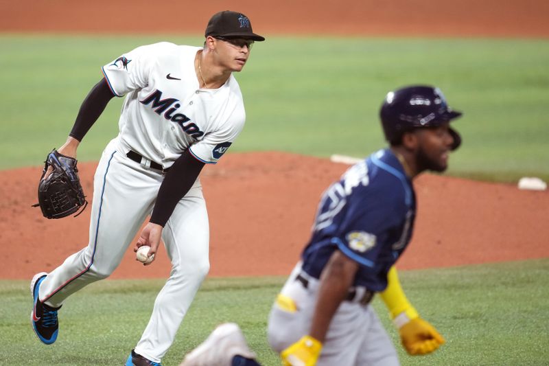 Aug 30, 2023; Miami, Florida, USA; Miami Marlins starting pitcher Jesus Luzardo (44) throws out Tampa Bay Rays shortstop Osleivis Basabe (37) in the fifth inning at loanDepot Park. Mandatory Credit: Jim Rassol-USA TODAY Sports