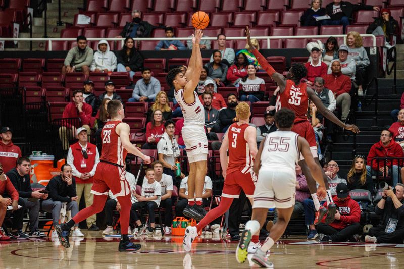 Feb 23, 2023; Stanford, California, USA;  Stanford Cardinal forward Jaylen Thompson (24) shoots the ball against Washington State Cougars forward Mouhamed Gueye (35) during the second half at Maples Pavilion. Mandatory Credit: Neville E. Guard-USA TODAY Sports