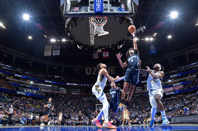 ORLANDO, FL - OCTOBER 28: Anthony Black #0 of the Orlando Magic drives to the basket during the game against the Indiana Pacers on October 28, 2024 at Kia Center in Orlando, Florida. NOTE TO USER: User expressly acknowledges and agrees that, by downloading and or using this photograph, User is consenting to the terms and conditions of the Getty Images License Agreement. Mandatory Copyright Notice: Copyright 2024 NBAE (Photo by Fernando Medina/NBAE via Getty Images)