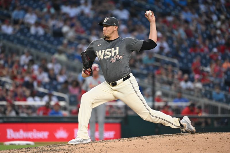 Jul 5, 2024; Washington, District of Columbia, USA; Washington Nationals relief pitcher Robert Garcia (61) throws a pitch against the St. Louis Cardinals during the sixth inning at Nationals Park. Mandatory Credit: Rafael Suanes-USA TODAY Sports