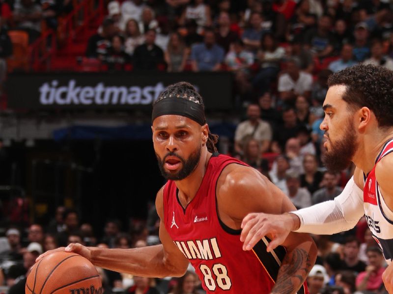 MIAMI, FL - MARCH 10: Patty Mills #88 of the Miami Heat handles the ball during the game against the Washington Wizards on March 10, 2024 at Kaseya Center in Miami, Florida. NOTE TO USER: User expressly acknowledges and agrees that, by downloading and or using this Photograph, user is consenting to the terms and conditions of the Getty Images License Agreement. Mandatory Copyright Notice: Copyright 2024 NBAE (Photo by Issac Baldizon/NBAE via Getty Images)