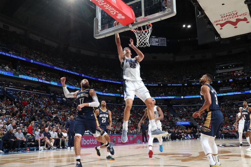 NEW ORLEANS, LA - APRIL 3:  Franz Wagner #22 of the Orlando Magic drives to the basket during the game against the New Orleans Pelicans on April 3, 2024 at the Smoothie King Center in New Orleans, Louisiana. NOTE TO USER: User expressly acknowledges and agrees that, by downloading and or using this Photograph, user is consenting to the terms and conditions of the Getty Images License Agreement. Mandatory Copyright Notice: Copyright 2024 NBAE (Photo by Layne Murdoch Jr./NBAE via Getty Images)