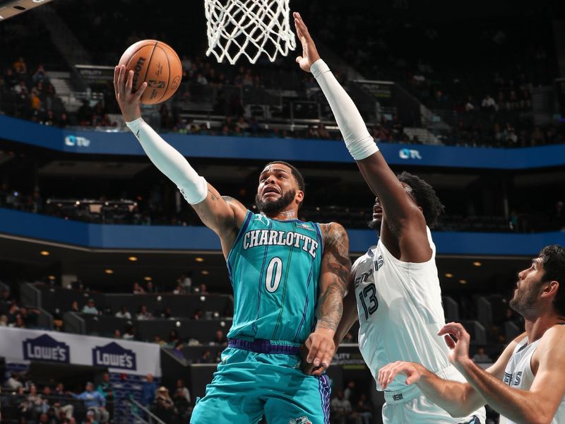 CHARLOTTE, NC - FEBRUARY 10:  Miles Bridges #0 of the Charlotte Hornets goes to the basket during the game on February 10, 2024 at Spectrum Center in Charlotte, North Carolina. NOTE TO USER: User expressly acknowledges and agrees that, by downloading and or using this photograph, User is consenting to the terms and conditions of the Getty Images License Agreement.  Mandatory Copyright Notice:  Copyright 2024 NBAE (Photo by Kent Smith/NBAE via Getty Images)