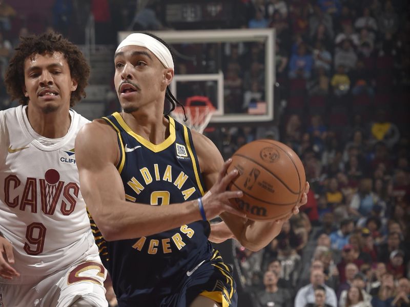 CLEVELAND, OH - APRIL 13:  Andrew Nembhard #2 of the Indiana Pacers handles the ball during the game against the Cleveland Cavaliers on April 13, 2025 at Rocket Arena in Cleveland, Ohio. NOTE TO USER: User expressly acknowledges and agrees that, by downloading and/or using this Photograph, user is consenting to the terms and conditions of the Getty Images License Agreement. Mandatory Copyright Notice: Copyright 2025 NBAE (Photo by David Liam Kyle/NBAE via Getty Images)