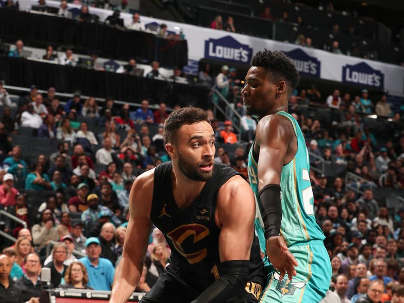 CHARLOTTE, NC - MARCH 27: Max Strus #1 of the Cleveland Cavaliers handles the ball during the game  on March 27, 2024 at Spectrum Center in Charlotte, North Carolina. NOTE TO USER: User expressly acknowledges and agrees that, by downloading and or using this photograph, User is consenting to the terms and conditions of the Getty Images License Agreement. Mandatory Copyright Notice: Copyright 2024 NBAE (Photo by Kent Smith/NBAE via Getty Images)