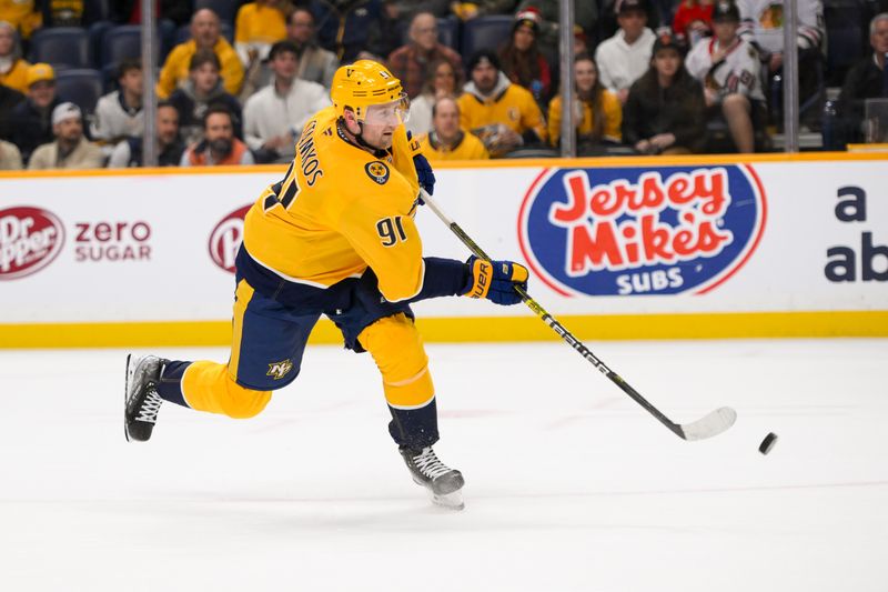 Jan 16, 2025; Nashville, Tennessee, USA;  Nashville Predators center Steven Stamkos (91) scores the game winning goal during the shootout against the Chicago Blackhawks  period at Bridgestone Arena. Mandatory Credit: Steve Roberts-Imagn Images