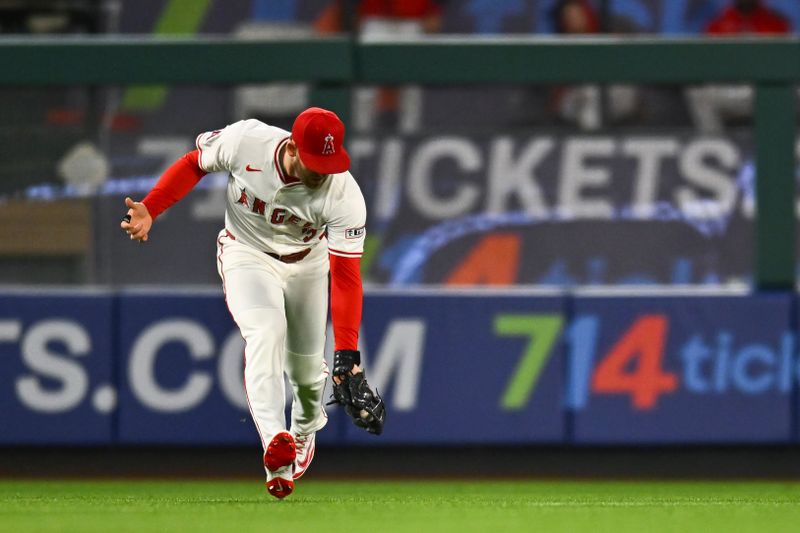 May 3, 2025; Anaheim, California, USA; Los Angeles Angels outfielder Taylor Ward (3) makes a catch against the Detroit Tigers during the sixth inning at Angel Stadium. Mandatory Credit: Jonathan Hui-Imagn Images