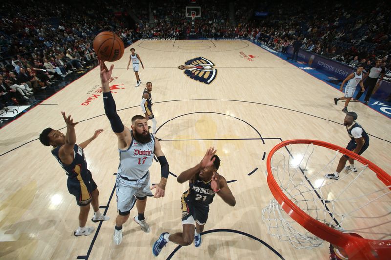 NEW ORLEANS, LA - JANUARY 3:  Jonas Valanciunas #17 of the Washington Wizards drives to the basket during the game against the New Orleans Pelicans on January 3, 2025 at the Smoothie King Center in New Orleans, Louisiana. NOTE TO USER: User expressly acknowledges and agrees that, by downloading and or using this Photograph, user is consenting to the terms and conditions of the Getty Images License Agreement. Mandatory Copyright Notice: Copyright 2025 NBAE (Photo by Layne Murdoch Jr./NBAE via Getty Images)