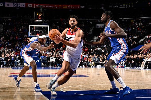 PHILADELPHIA, PA - DECEMBER 11: Anthony Gill #16 of the Washington Wizards drives to the basket during the game against the Philadelphia 76ers on December 11, 2023 at the Wells Fargo Center in Philadelphia, Pennsylvania NOTE TO USER: User expressly acknowledges and agrees that, by downloading and/or using this Photograph, user is consenting to the terms and conditions of the Getty Images License Agreement. Mandatory Copyright Notice: Copyright 2023 NBAE (Photo by David Dow/NBAE via Getty Images)