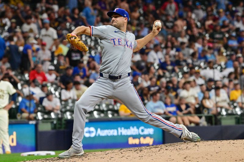 Jun 25, 2024; Milwaukee, Wisconsin, USA; Texas Rangers relief pitcher Brock Burke (46) pitches against the Milwaukee Brewers in the sixth inning at American Family Field. Mandatory Credit: Benny Sieu-USA TODAY Sports