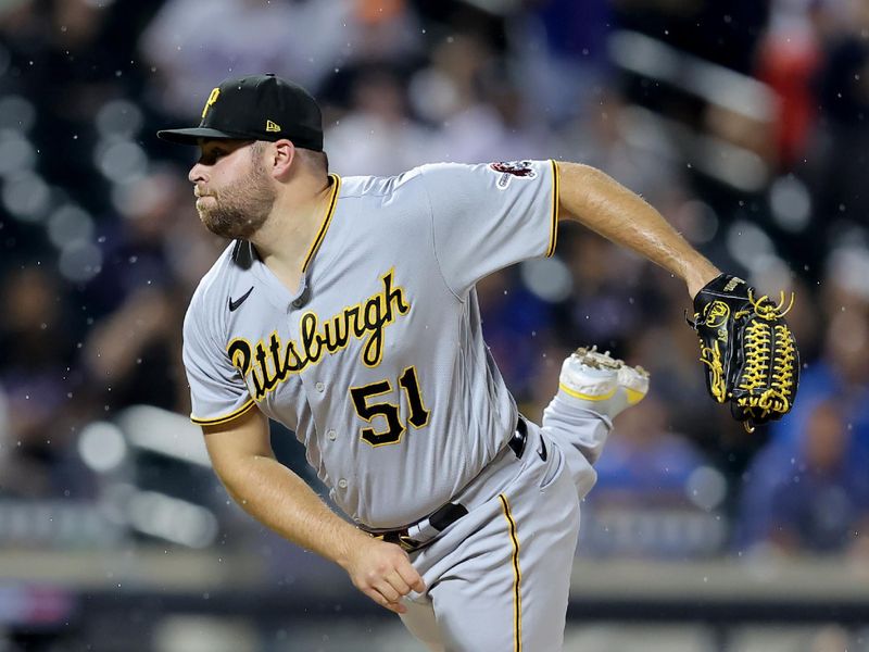 Aug 15, 2023; New York City, New York, USA; Pittsburgh Pirates relief pitcher David Bednar (51) follows through on a pitch against the New York Mets during the ninth inning at Citi Field. Mandatory Credit: Brad Penner-USA TODAY Sports