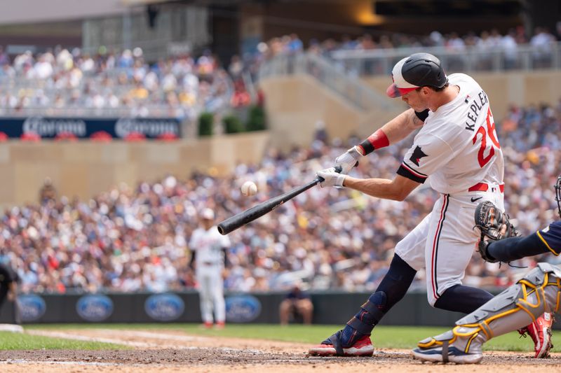 Jul 21, 2024; Minneapolis, Minnesota, USA; Minnesota Twins right field Max Kepler (26) connects in the fifth inning against the Milwaukee Brewers at Target Field. Mandatory Credit: Matt Blewett-USA TODAY Sports