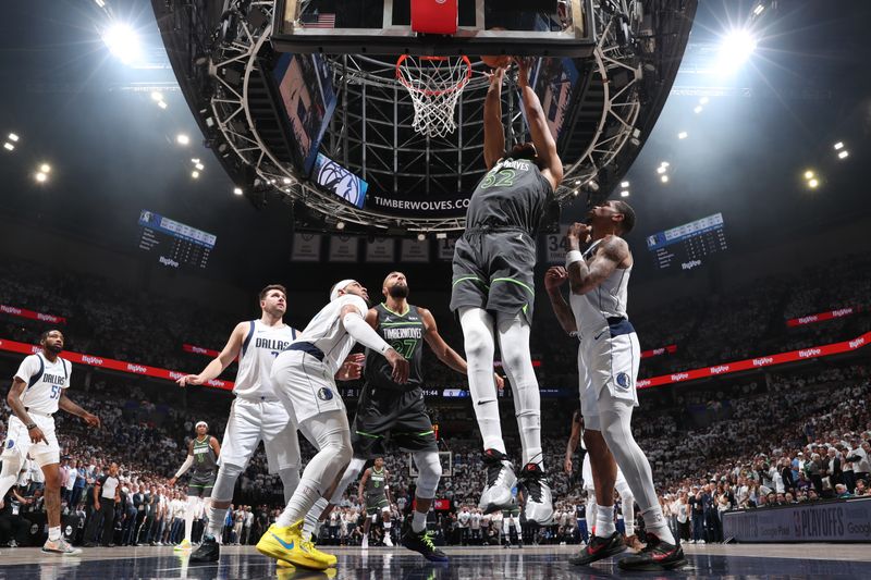 MINNEAPOLIS, MN - MAY 30: Karl-Anthony Towns #32 of the Minnesota Timberwolves drives to the basket during the game against the Dallas Mavericks during Round 3 Game 5 of the 2024 NBA Playoffs on May 30, 2024 at Target Center in Minneapolis, Minnesota. NOTE TO USER: User expressly acknowledges and agrees that, by downloading and or using this Photograph, user is consenting to the terms and conditions of the Getty Images License Agreement. Mandatory Copyright Notice: Copyright 2024 NBAE (Photo by Joe Murphy/NBAE via Getty Images)