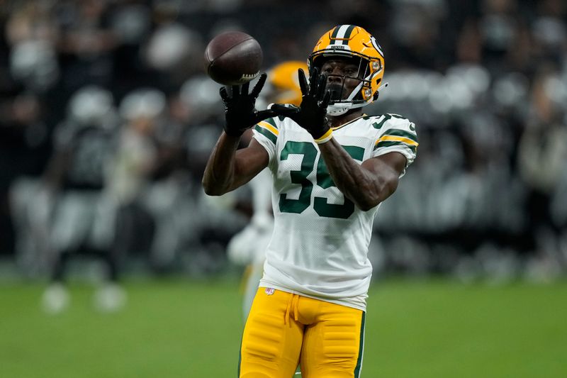 Green Bay Packers cornerback Corey Ballentine (35) warms up before an NFL football game against the Las Vegas Raiders, Monday, Oct. 9, 2023, in Las Vegas. (AP Photo/John Locher)