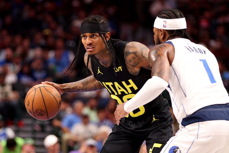 DALLAS, TEXAS - OCTOBER 10: Jordan Clarkson #00 of the Utah Jazz looks to pass the ball against Jaden Hardy #1 of the Dallas Mavericks in the second half at American Airlines Center on October 10, 2024 in Dallas, Texas. NOTE TO USER: User expressly acknowledges and agrees that, by downloading and or using this Photograph, user is consenting to the terms and conditions of the Getty Images License Agreement. Mandatory Copyright Notice: Copyright 2024 NBAE  (Photo by Tim Heitman/Getty Images)