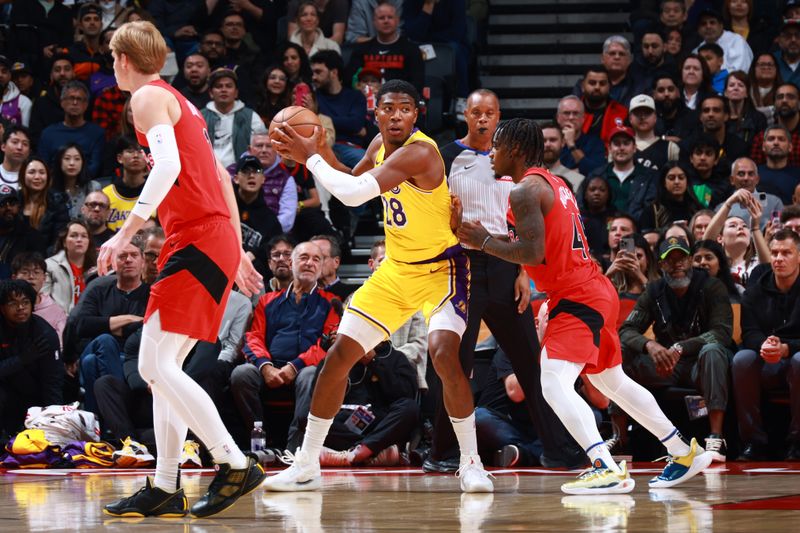 TORONTO, CANADA - NOVEMBER 1: Rui Hachimura #28 of the Los Angeles Lakers handles the ball during the game against the Toronto Raptors on November 1, 2024 at the Scotiabank Arena in Toronto, Ontario, Canada.  NOTE TO USER: User expressly acknowledges and agrees that, by downloading and or using this Photograph, user is consenting to the terms and conditions of the Getty Images License Agreement.  Mandatory Copyright Notice: Copyright 2024 NBAE (Photo by Vaughn Ridley/NBAE via Getty Images)