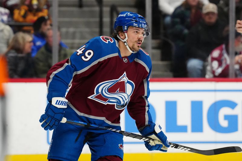 Dec 31, 2023; Denver, Colorado, USA; Colorado Avalanche defenseman Samuel Girard (49) during the first period against the San Jose Sharks at Ball Arena. Mandatory Credit: Ron Chenoy-USA TODAY Sports