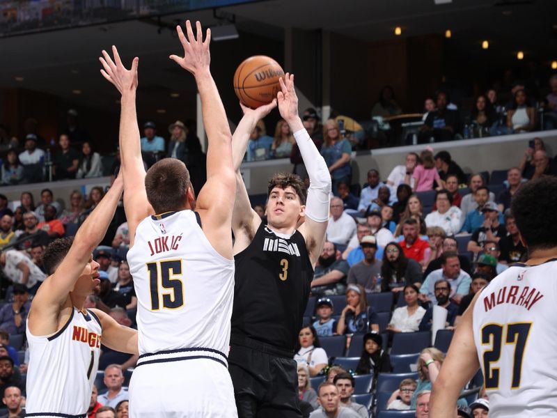 MEMPHIS, TN - APRIL 14:  Jake LaRavia #3 of the Memphis Grizzlies shoots the ball during the game against the Denver Nuggets on April 14, 2024 at FedExForum in Memphis, Tennessee. NOTE TO USER: User expressly acknowledges and agrees that, by downloading and or using this photograph, User is consenting to the terms and conditions of the Getty Images License Agreement. Mandatory Copyright Notice: Copyright 2024 NBAE (Photo by Joe Murphy/NBAE via Getty Images)